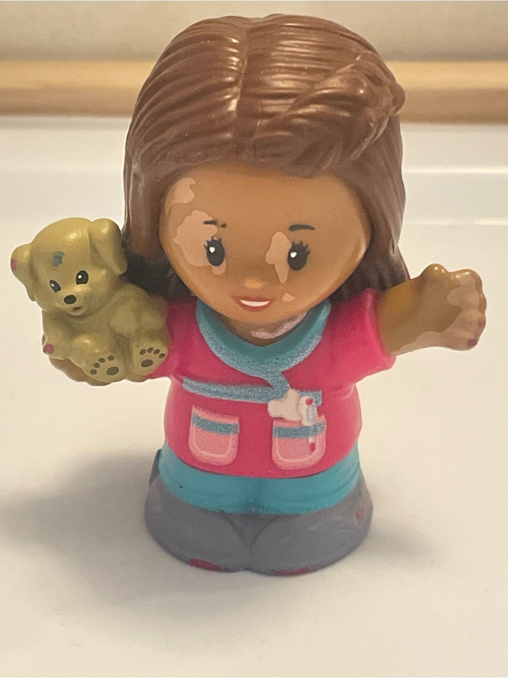 Little People Veterinarian girl with vitiligo Pink Shirt Girl Holding Puppy toy